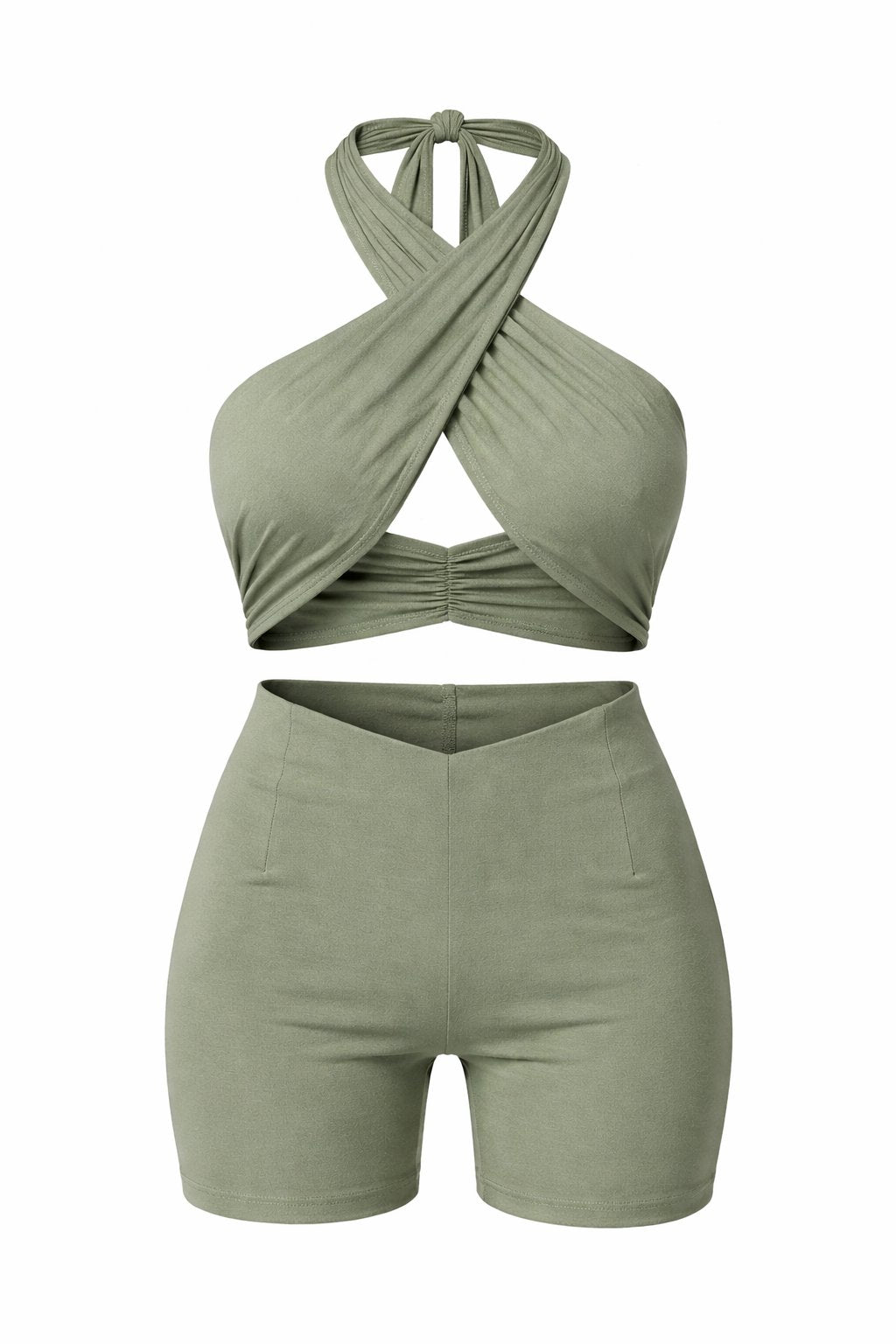 Green crop top and shorts set on a white background