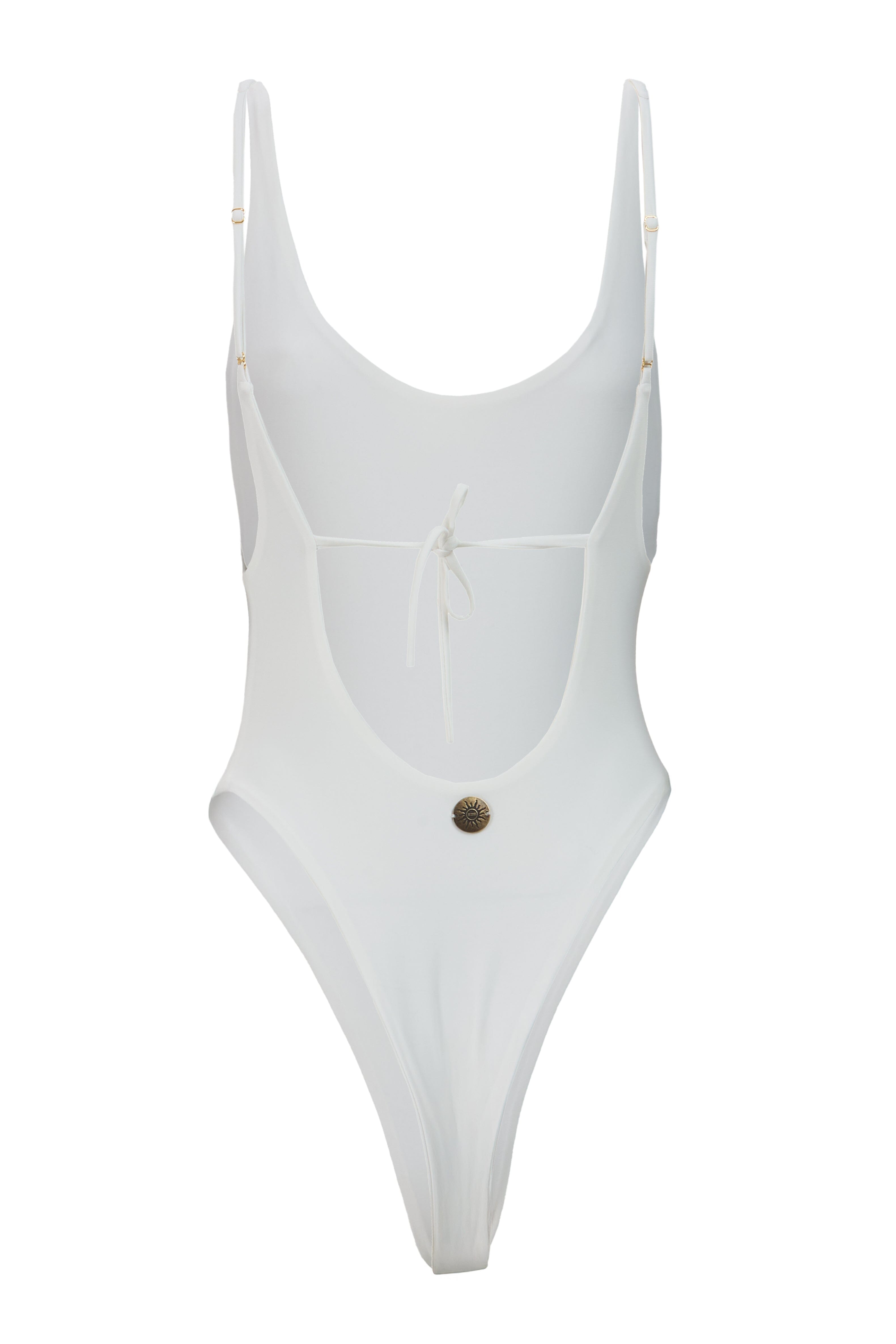 White swimsuit with a button detail on a white background