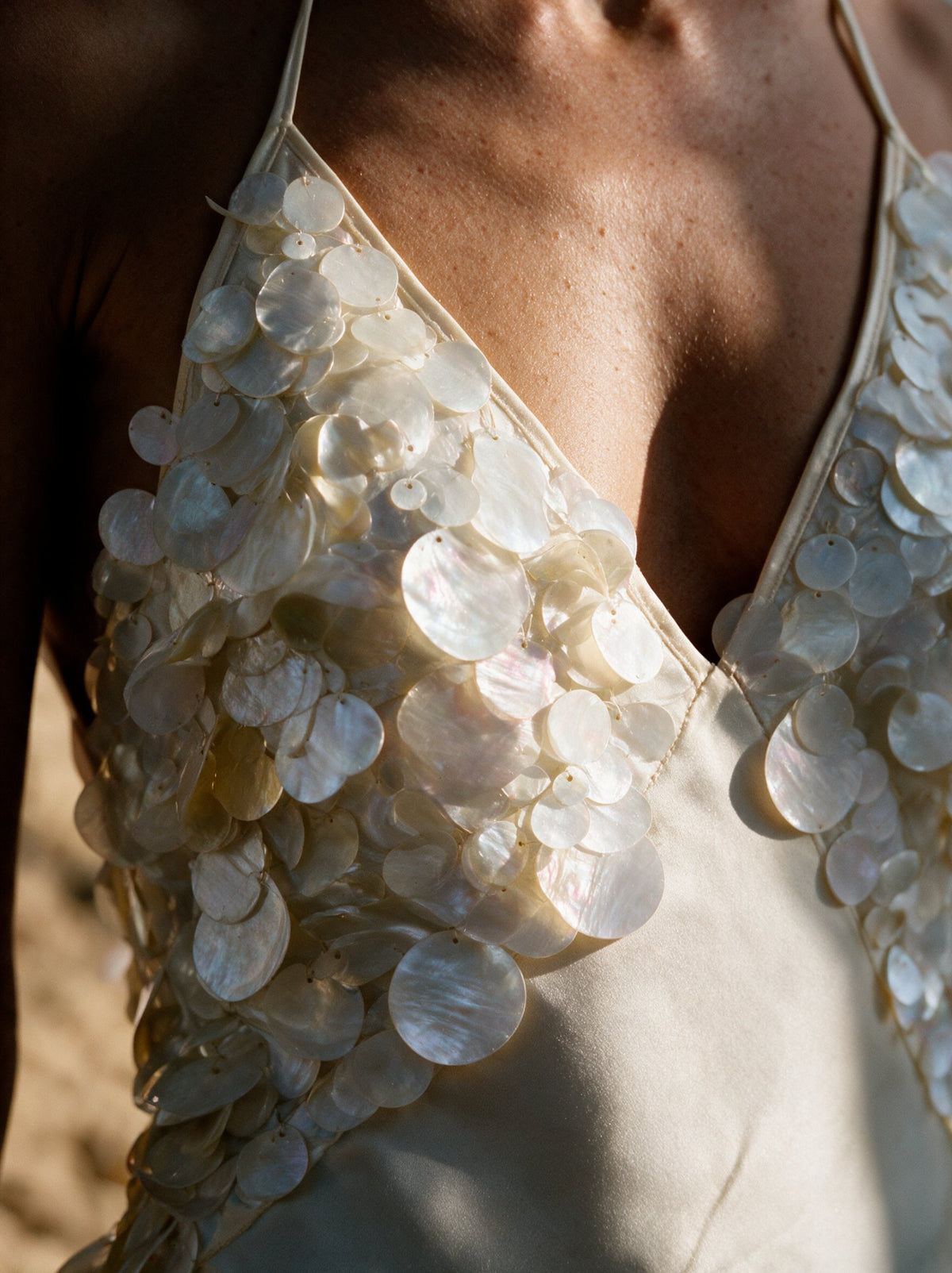 sequin embrodery on satin dress 